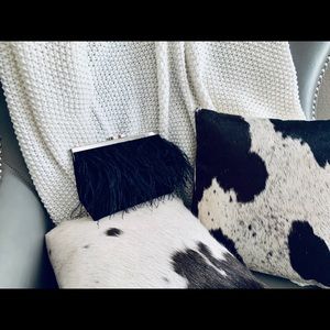 Black feathery clutch